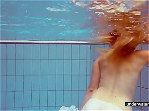 nice ginger-haired plays naked underwater